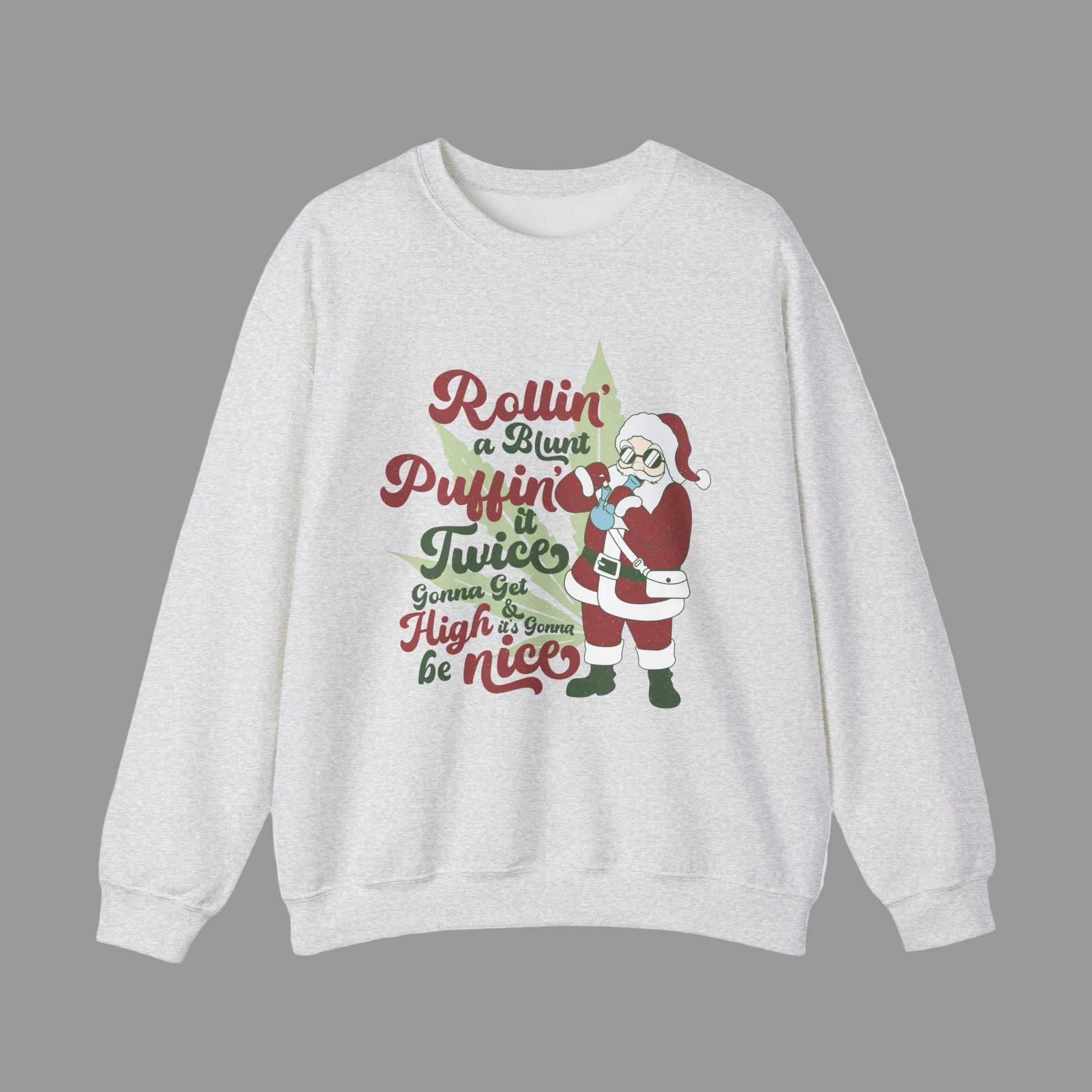 A light gray crewneck sweatshirt featuring a festive Christmas graphic with a cartoon Santa Claus and the text 'Rollin' a Blunt, Puffin' it Twice, Gonna Go High & Be Nice'.