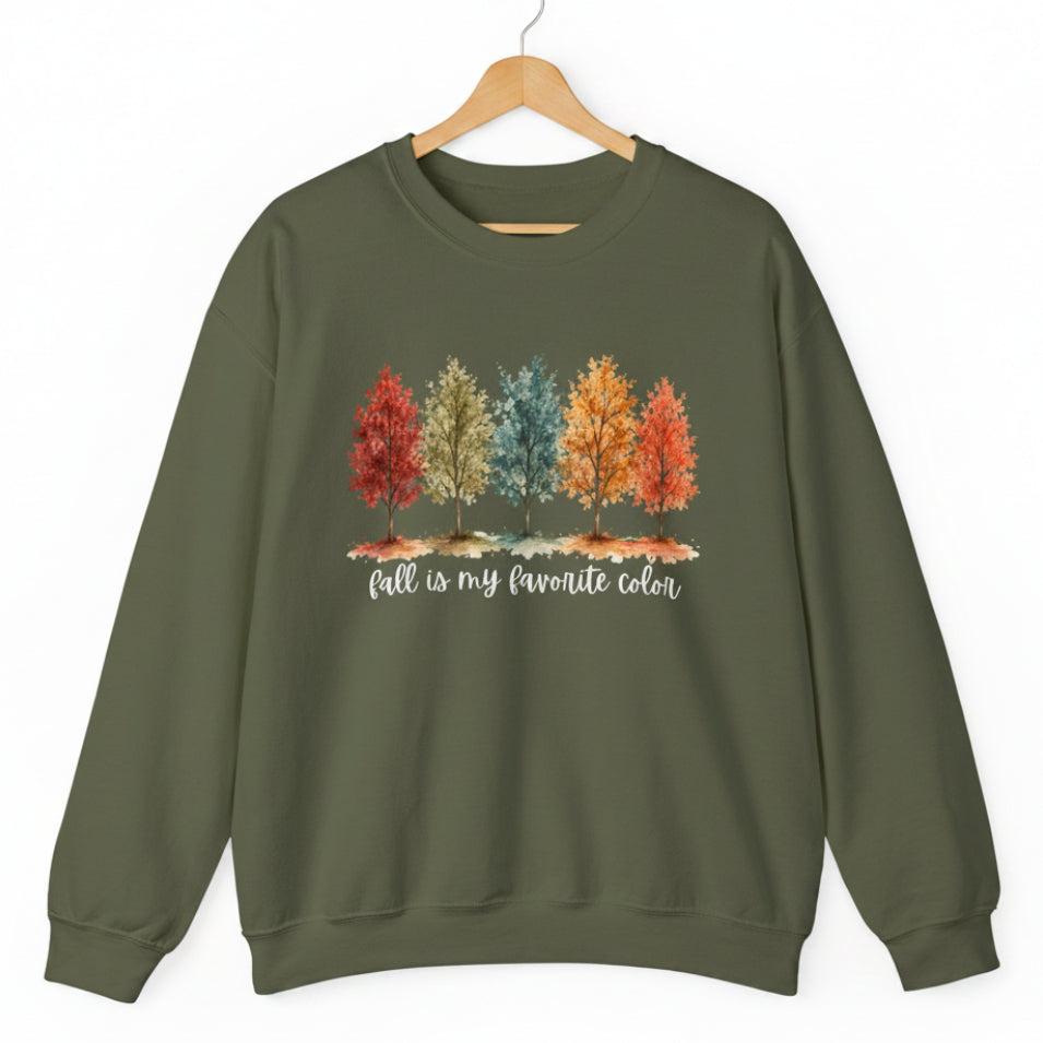 A military green crewneck sweatshirt featuring a graphic of five colorful autumn trees and the text 'fall is my favorite color' printed on the chest, displayed against a solid white background.