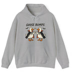 Gray hoodie with two geese dressed as vampires doing fist bumps