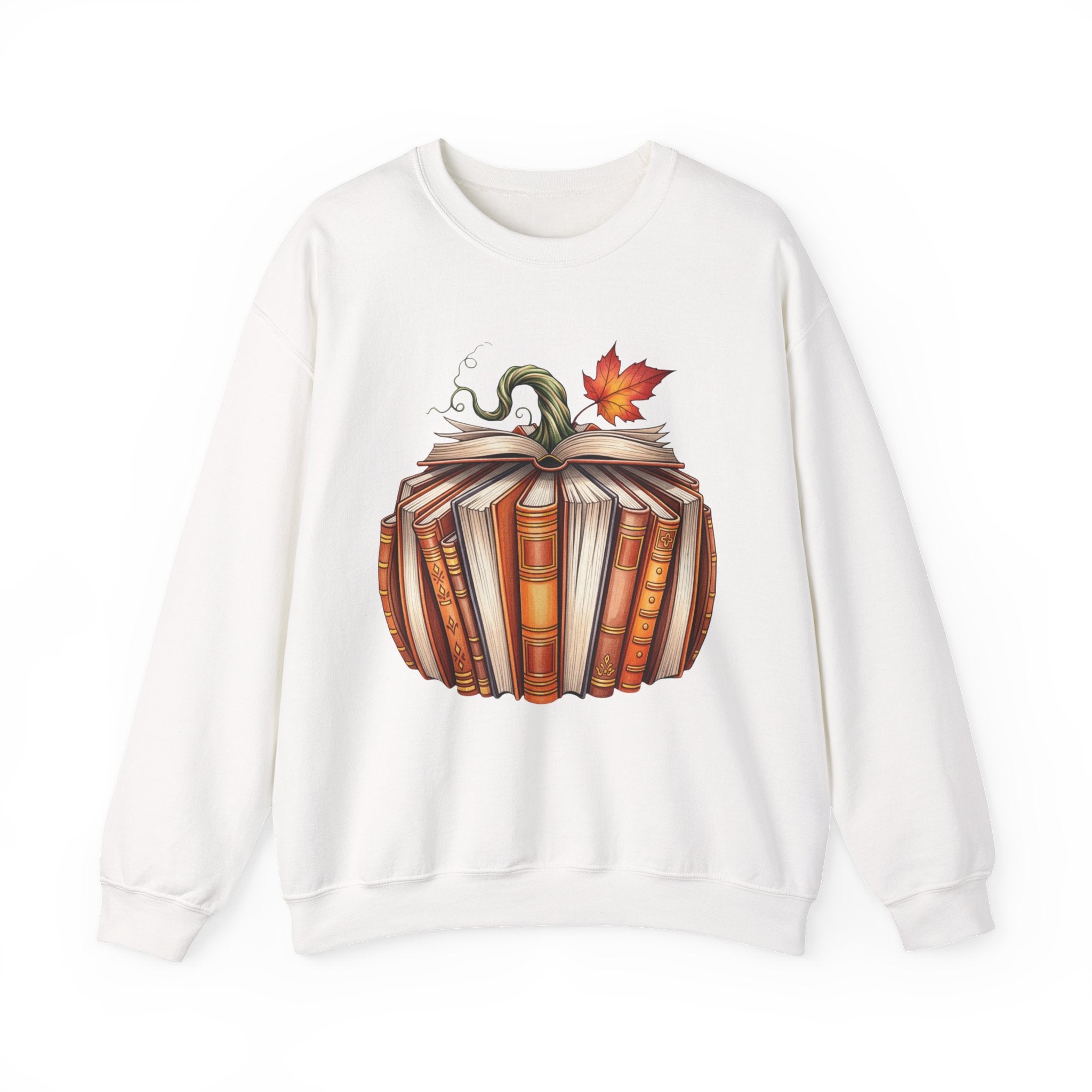 An white crewneck sweatshirt featuring a graphic of a pumpkin made of stacked books with a green stem and an orange autumn leaf on top, displayed against a solid white background.