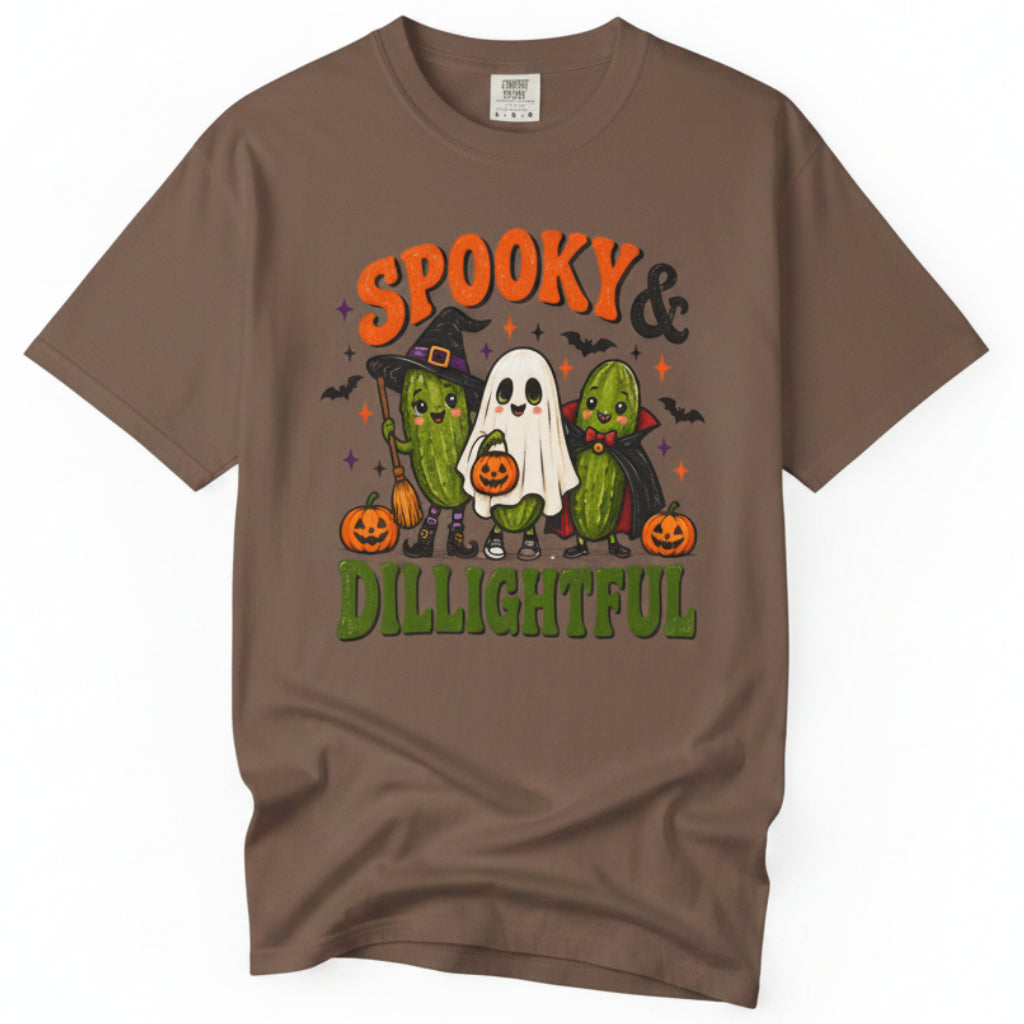 A brown short-sleeve crewneck t-shirt featuring a colorful Halloween graphic with the text 'SPOOKY & DILIGHTFUL' and cartoon cactus ghosts, displayed on a clean white background.