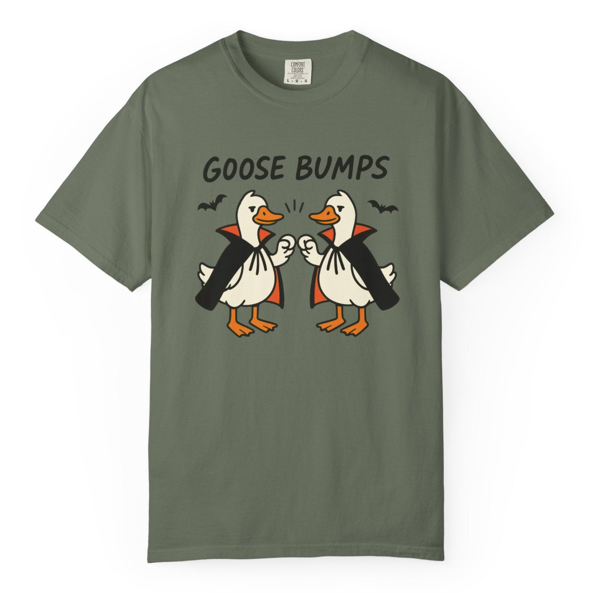 A mos short-sleeve t-shirt with a graphic of two geese in black and orange, with the text 'GOOSE BUMPS' above them