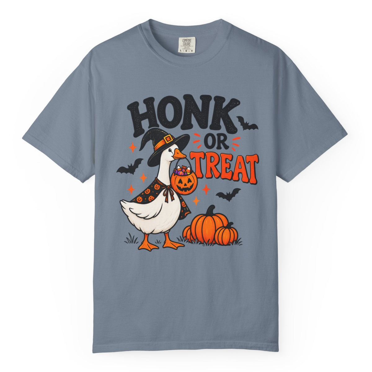 A slate blue short-sleeve t-shirt with a Halloween graphic featuring a goose dressed as a witch, pumpkins, bats, and the text 'HONK OR TREAT'.