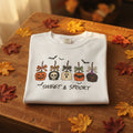 A white short-sleeve crewneck t-shirt featuring a 'Sweet & Spooky' Halloween graphic on the chest
