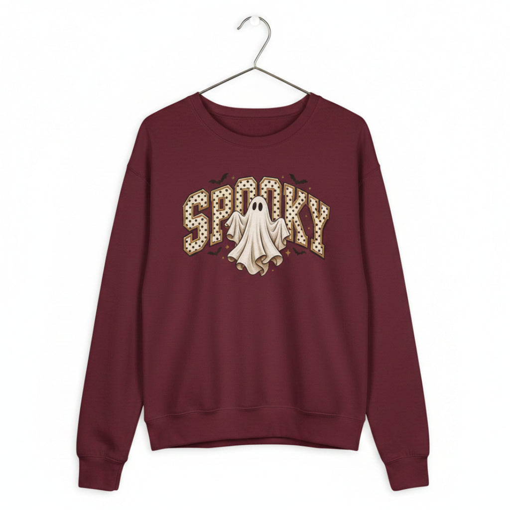A maroon crewneck sweatshirt featuring a 'SPOOKY' graphic on the chest with a white ghost illustration.