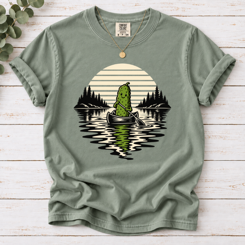 Canoeing pickle under a retro sunset on a Bay T-shirt.