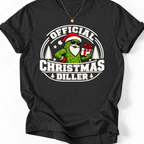 Black Official Christmas Diller graphic T-shirt design featuring a green pickle Santa wearing sunglasses and holding a Christmas present, with festive trees and bold holiday lettering.