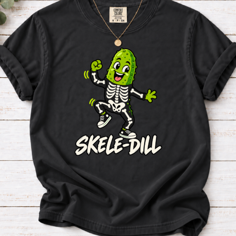 Black Skele-Dill T-shirt featuring a dancing pickle in a skeleton costume with SKELE-DILL lettering