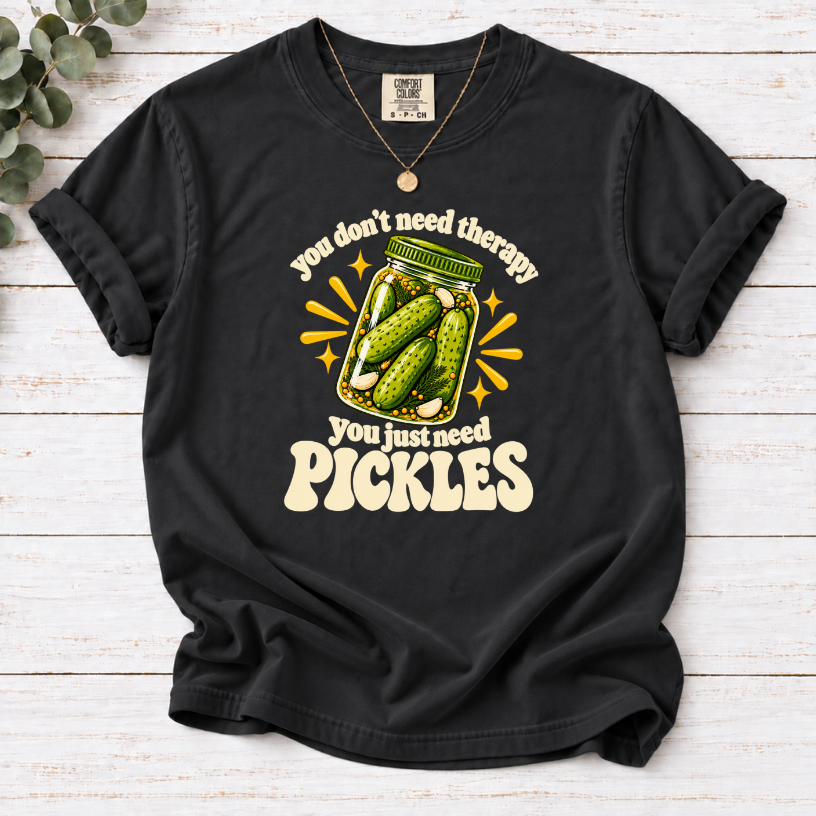 Black T-shirt with a green pickle jar and cream lettering: You don’t need therapy, you just need pickles