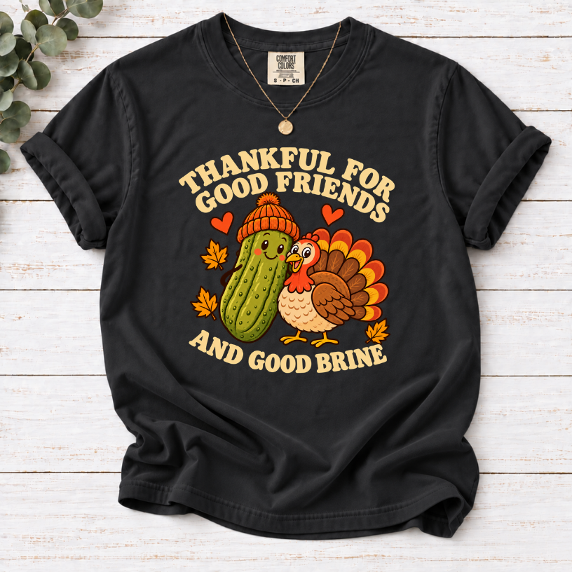  Black tee with pickle and turkey friends and the text “Thankful for good friends and good brine”