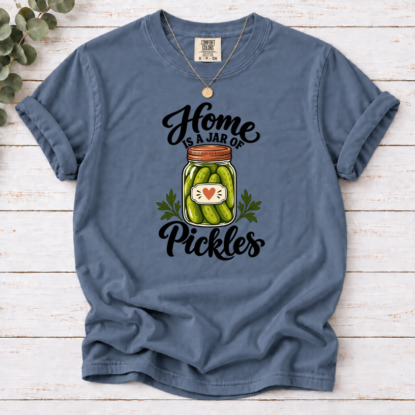 Blue Jean T-shirt with a heart-labeled pickle jar graphic and black ‘Home Is a Jar of Pickles’ lettering