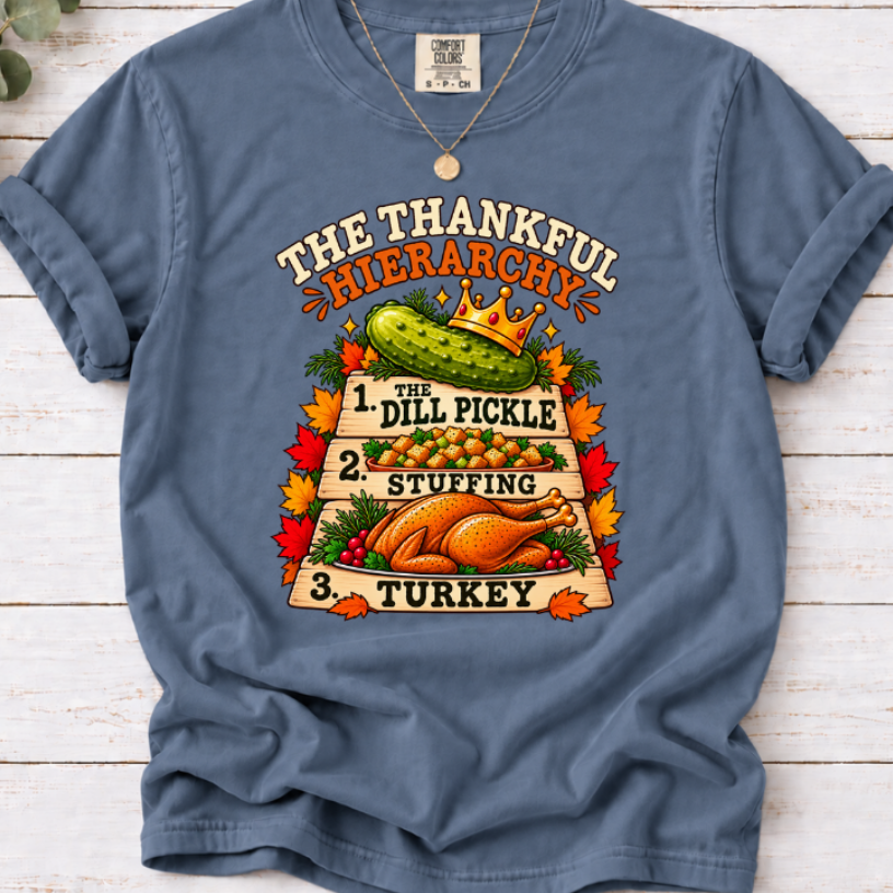 Blue Jean T-shirt with The Thankful Hierarchy design featuring a crowned dill pickle, stuffing, turkey, and fall leaves