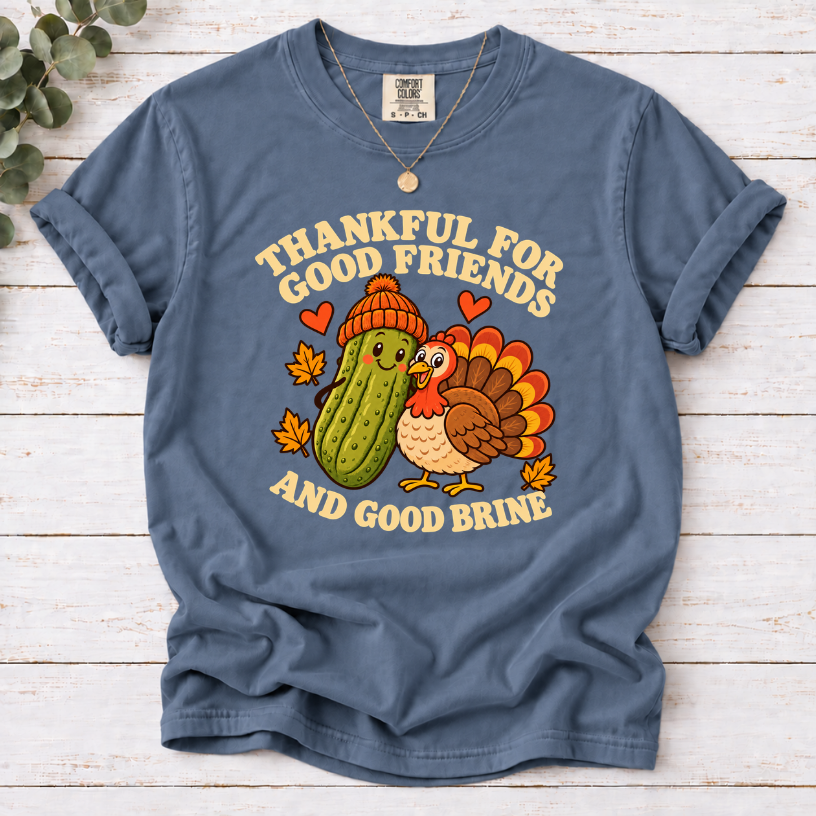 Blue Jean  tee with pickle and turkey friends and the text “Thankful for good friends and good brine”