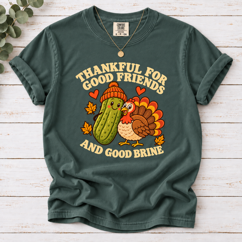 Blue Spruce  tee with pickle and turkey friends and the text “Thankful for good friends and good brine”
