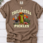 Espresso brown tailgates & Pickles’ T-shirt featuring a pickle grilling beside a folding chair, football, and fall leaves