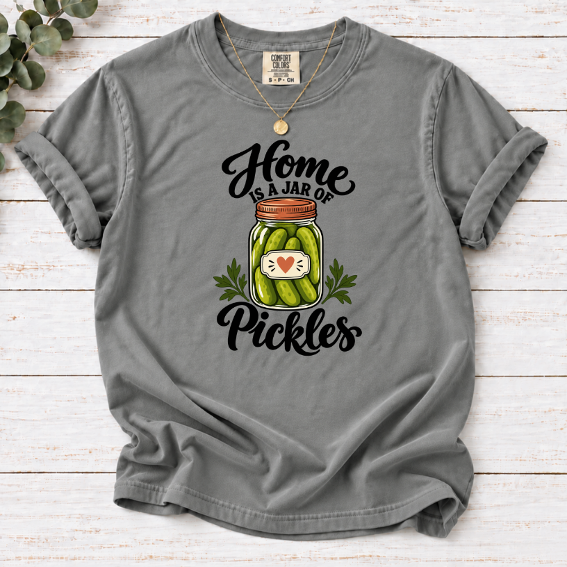 Gray T-shirt with a heart-labeled pickle jar graphic and black ‘Home Is a Jar of Pickles’ lettering