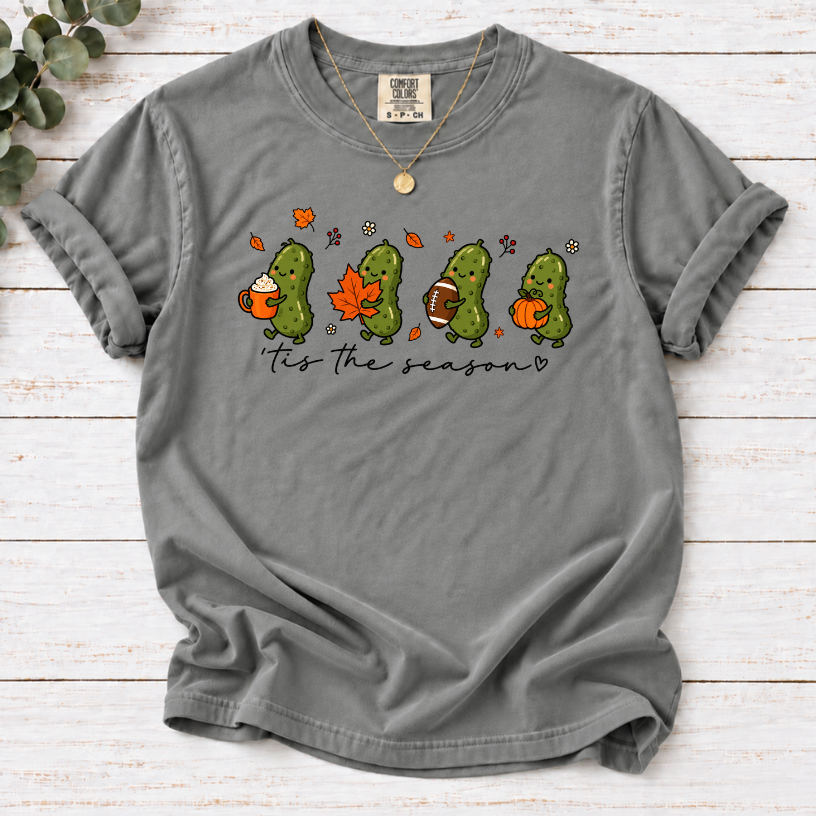 Grey tis the season tee with four pickles holding a latte, maple leaf, football and pumpkin.