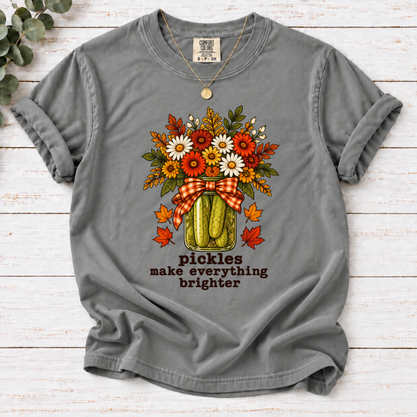 Grey tee with pickle jar flower bouquet, gingham bow and the text “pickles make everything brighter”