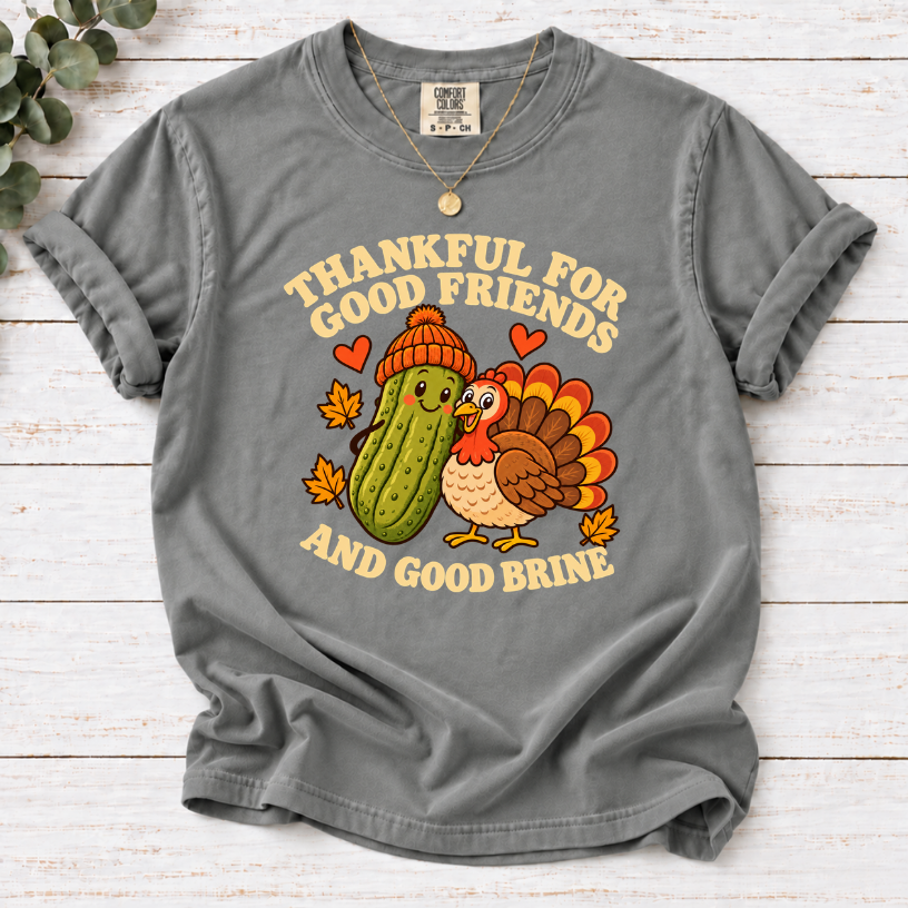Grey  tee with pickle and turkey friends and the text “Thankful for good friends and good brine”