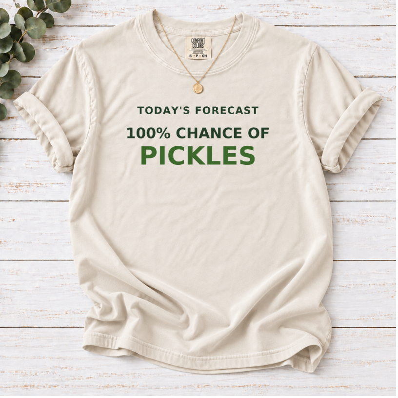 ivory  T-shirt with a ‘100% chance of pickles’ forecast design.