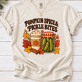 Vintage Pumpkin Spice & Pickle Bites design with dark brown lettering, a coffee cup, pickle jar, autumn leaves, and cinnamon sticks on Ivory Shirt
