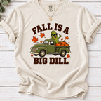 ivory Fall Is a Big Dill shirt design featuring a pickle wearing sunglasses in a vintage green pickup truck with pumpkins and autumn leaves.