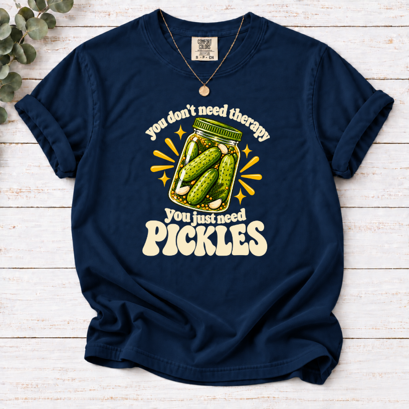 Navy T-shirt with a green pickle jar and cream lettering: You don’t need therapy, you just need pickles