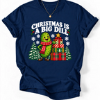 Navy T-shirt with “Christmas Is a Big Dill” lettering and a smiling pickle in a red scarf beside stacked gifts and snowy trees.