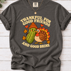 Pepper tee with pickle and turkey friends and the text “Thankful for good friends and good brine”